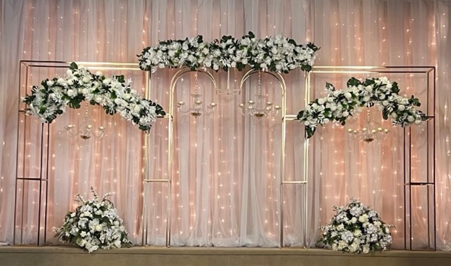 Gold Arch Display with Chandeliers